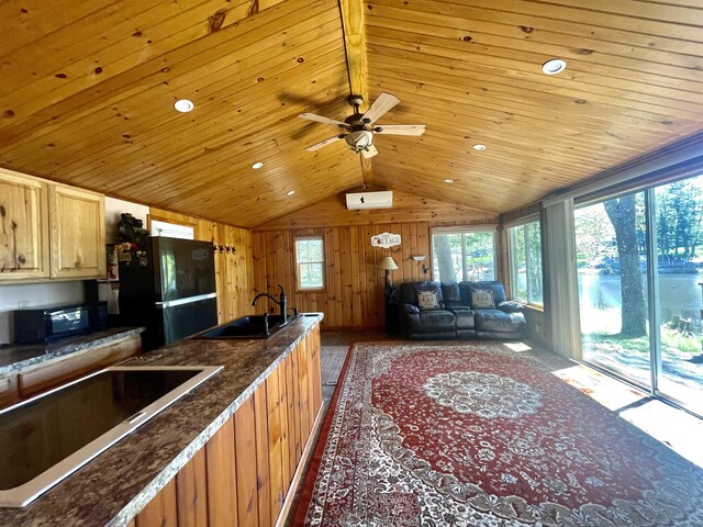 1548 Pioneer Rd, Alger, MI 48610 - kitchen featuring lofted ceiling, wooden ceiling, a sink, and black appliances
