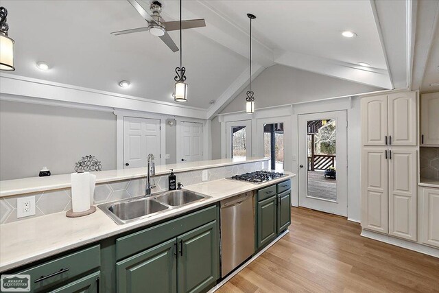 455 Garfield Rd, Fostoria, MI 48435 - kitchen featuring a ceiling fan, appliances with stainless steel finishes, a sink, lofted ceiling with beams, and green cabinetry