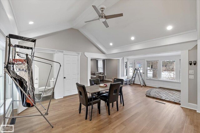 455 Garfield Rd, Fostoria, MI 48435 - dining room with lofted ceiling with beams, a ceiling fan, light wood-style flooring, and visible vents