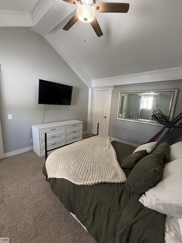 455 Garfield Rd, Fostoria, MI 48435 - carpeted bedroom featuring baseboards, lofted ceiling with beams, and a ceiling fan