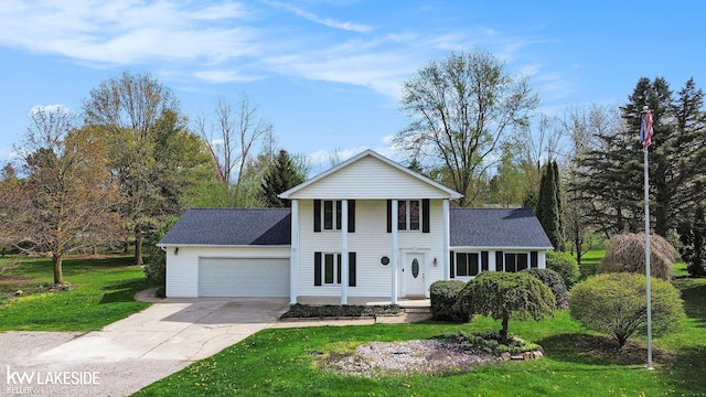 36870 Hebel Rd, Richmond Twp, MI 48062 - neoclassical home with roof with shingles, an attached garage, a front lawn, a porch, and driveway