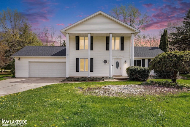 36870 Hebel Rd, Richmond Twp, MI 48062 - neoclassical home with a garage, concrete driveway, roof with shingles, and a front yard