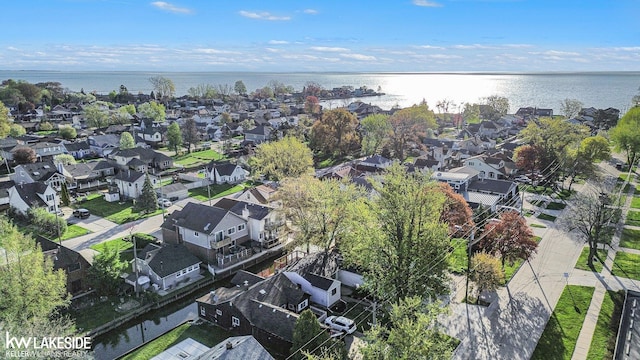 aerial view featuring a residential view and a water view