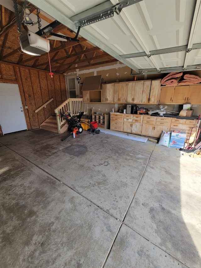 garage featuring a garage door opener