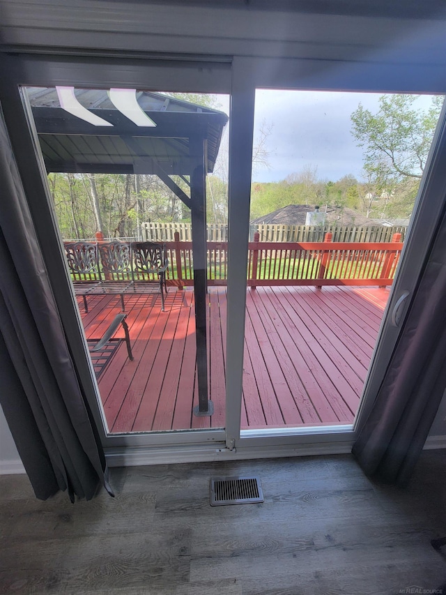 wooden deck with visible vents