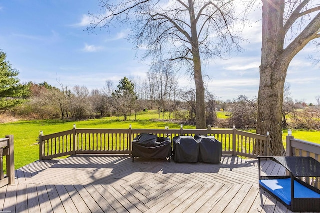 deck featuring a yard