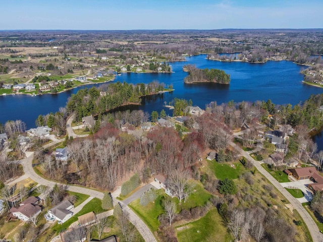 birds eye view of property featuring a water view and a residential view