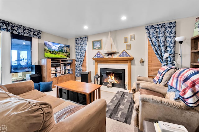 carpeted living room featuring a fireplace