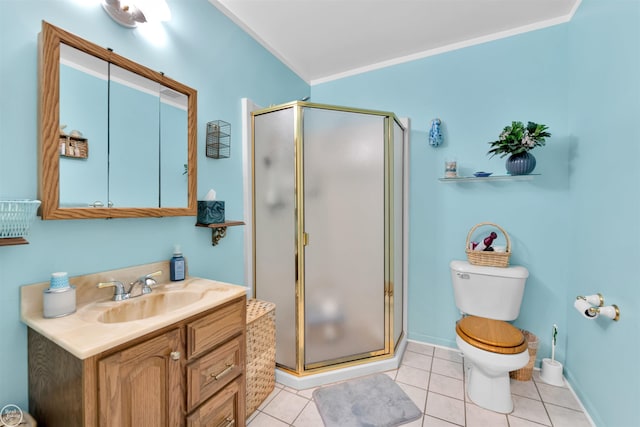 bathroom with crown molding, tile patterned flooring, a shower stall, vanity, and toilet