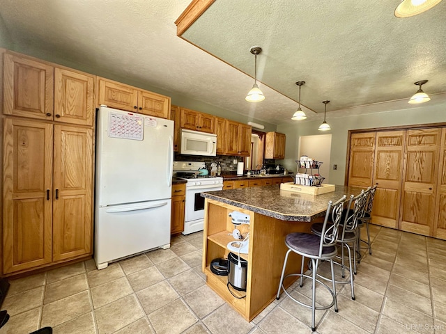 kitchen featuring open shelves, white appliances, a kitchen breakfast bar, a center island, and a textured ceiling