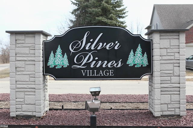 view of community sign