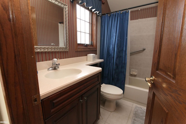 full bathroom featuring vanity, shower / bathtub combination with curtain, tile patterned floors, and toilet