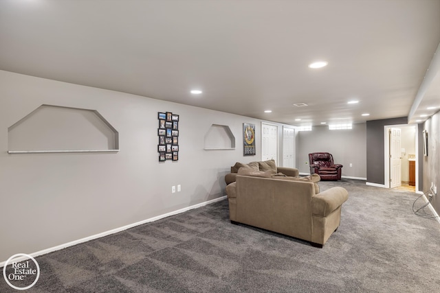 carpeted living room featuring recessed lighting and baseboards