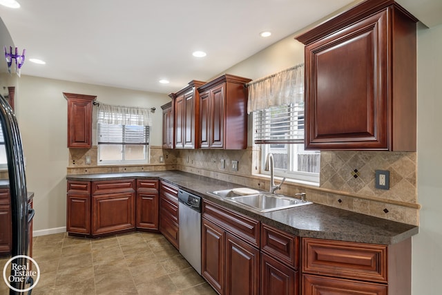 kitchen featuring dark brown cabinets, dark countertops, a sink, dishwasher, and recessed lighting