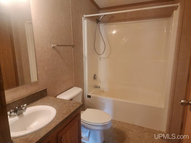 bathroom with toilet, shower / tub combination, and vanity