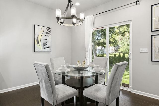 dining space featuring an inviting chandelier, recessed lighting, baseboards, and dark wood-style floors