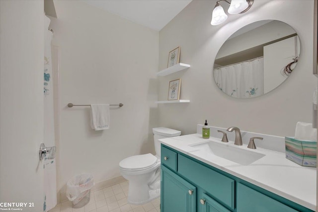 full bathroom with vanity, tile patterned flooring, toilet, and curtained shower