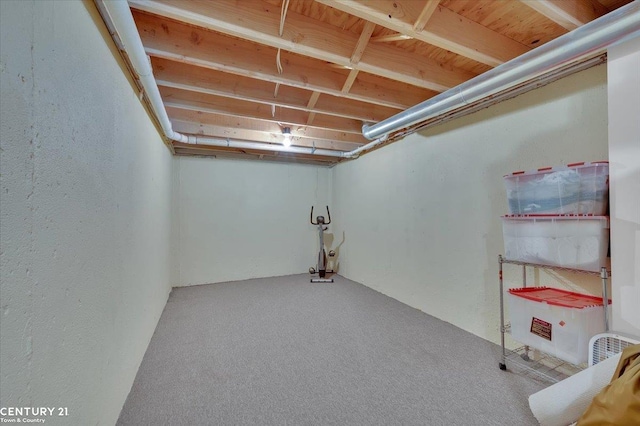 finished basement with carpet flooring