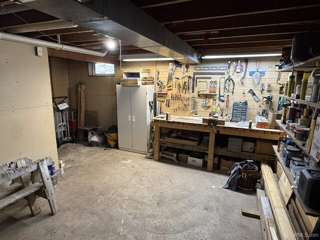 below grade area featuring a workshop area
