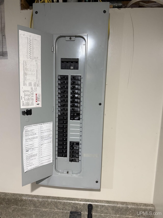 utility room featuring electric panel