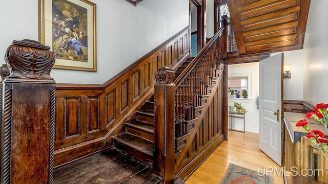staircase with wood finished floors