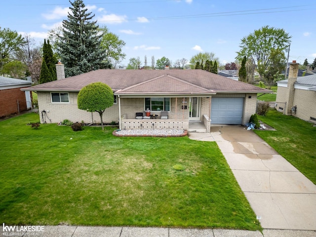 ranch-style home featuring a porch, brick siding, an attached garage, and a front lawn