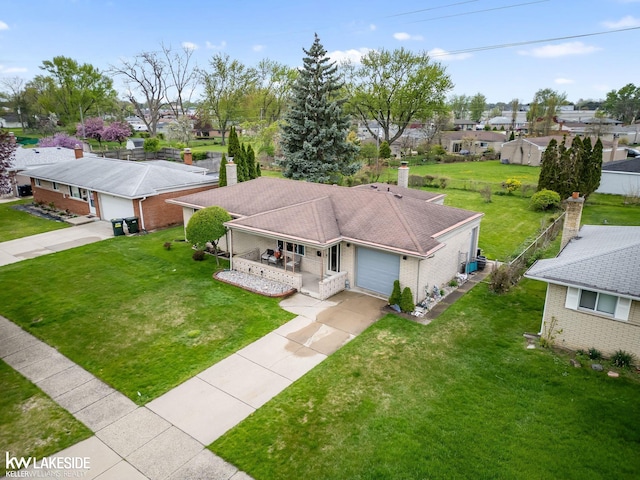 drone / aerial view with a residential view