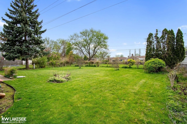 view of yard featuring fence