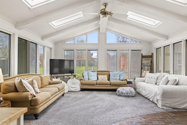 sunroom with lofted ceiling with skylight, brick floor, and a healthy amount of sunlight