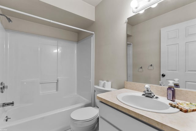 full bath featuring bathing tub / shower combination, vanity, and toilet