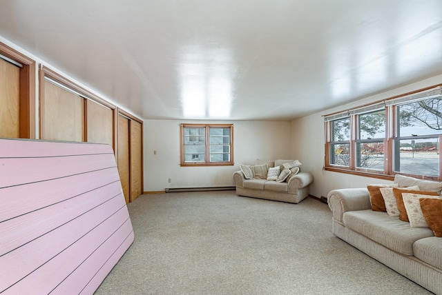 living room featuring baseboards, light carpet, and a baseboard radiator