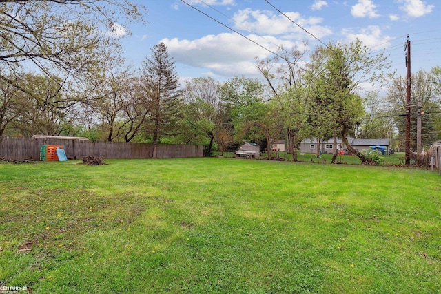 view of yard featuring fence