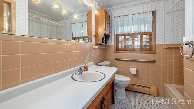 1252 S Kimberly Ave, Iron Mountain, MI 49801 - bathroom with tile walls, a shower, tile patterned floors, a baseboard radiator, and toilet