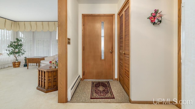 entryway with a baseboard radiator