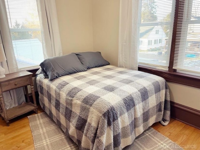 bedroom featuring wood finished floors