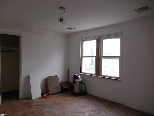 unfurnished bedroom with visible vents