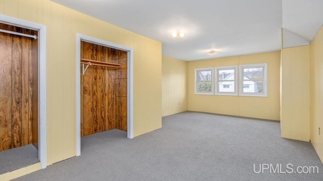 unfurnished bedroom with carpet