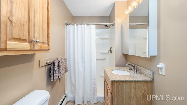 full bath with vanity, a baseboard radiator, toilet, and curtained shower