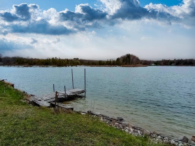 view of dock with a water view