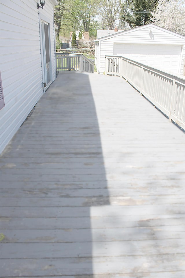 deck with an outbuilding
