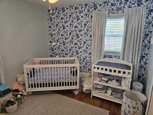 bedroom with wood finished floors