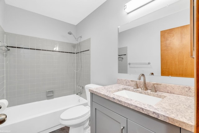 full bathroom featuring toilet,  shower combination, and vanity
