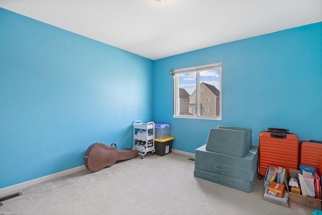playroom with carpet flooring, baseboards, and visible vents