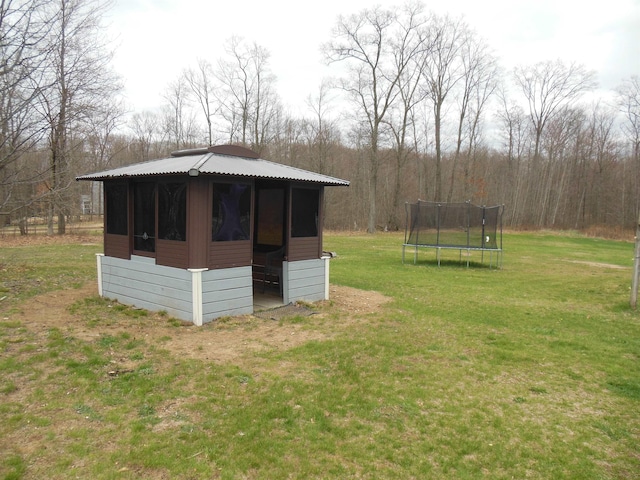 view of outdoor structure featuring a trampoline