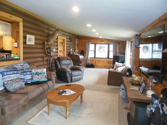 living area featuring recessed lighting, log walls, and carpet floors