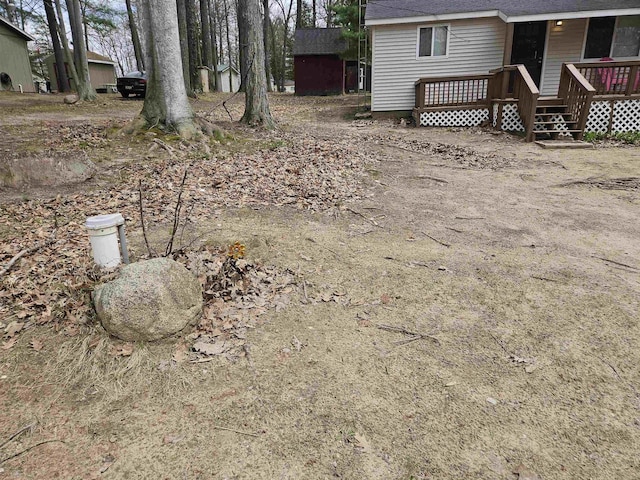 view of yard with a deck
