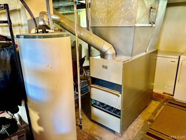 utility room with heating unit and gas water heater