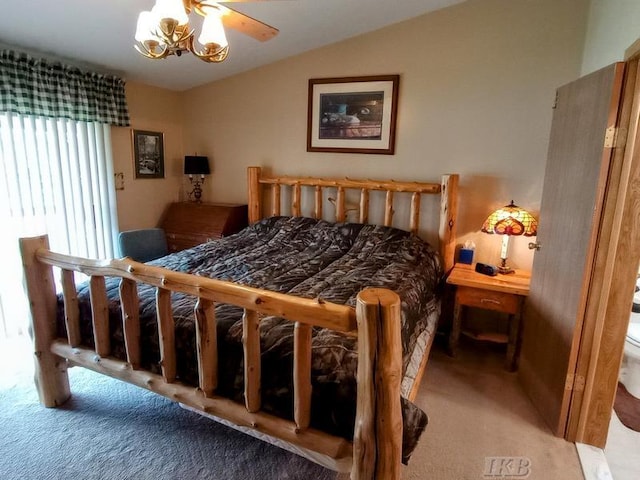 bedroom featuring light carpet and vaulted ceiling