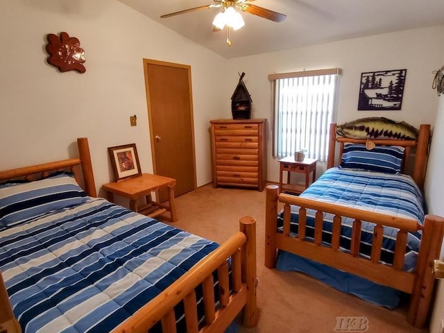 bedroom with carpet floors, ceiling fan, and lofted ceiling