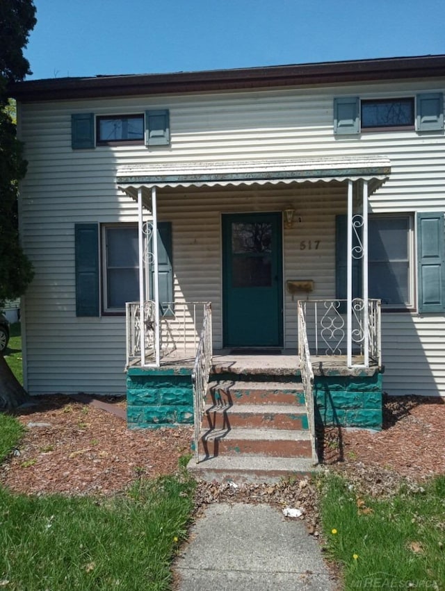 view of property with a porch